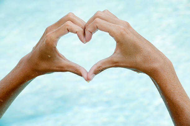 istock Natural Female Hands Heart with Pool Background (XXXL) 185286958