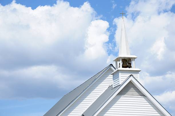 istock Church chapel steeple with clouds 185287040