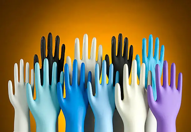 Color variation of disposable latex glove. Copy space above easy to insert headline or text.