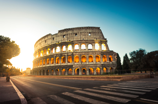 Colosseum in Rome in the light of rising sun.