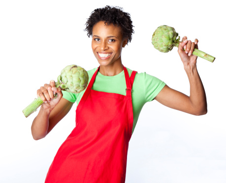 smiling green grocer with two artichokes - on white background