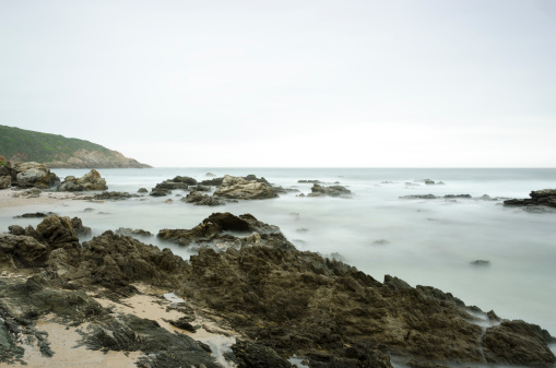 Long exposure capture of Herolds Bay shores in South Africa.See more Garden Route here