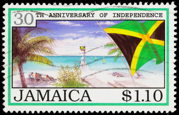 флаг ямайки и пляж почтовая марка - mail postage stamp postmark jamaica стоковые фото и изображения
