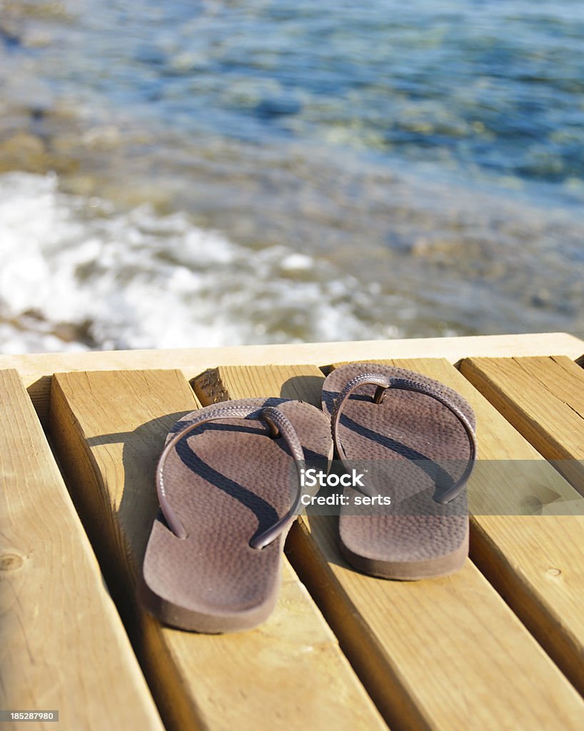 Flip flops und Urlaub - Lizenzfrei Anlegestelle Stock-Foto