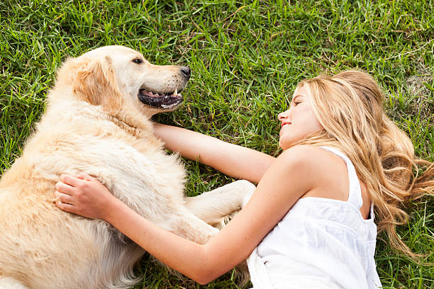 istock Woman Lying With Dog 185288007