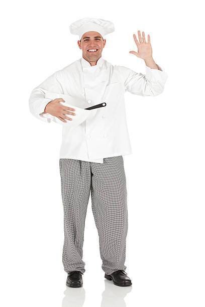 istock Chef holding mixing bowl and waving his hand 185288071