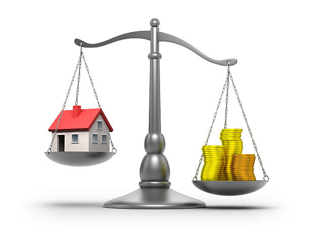 istock Scales with house and money - isolated / clipping path 185289029