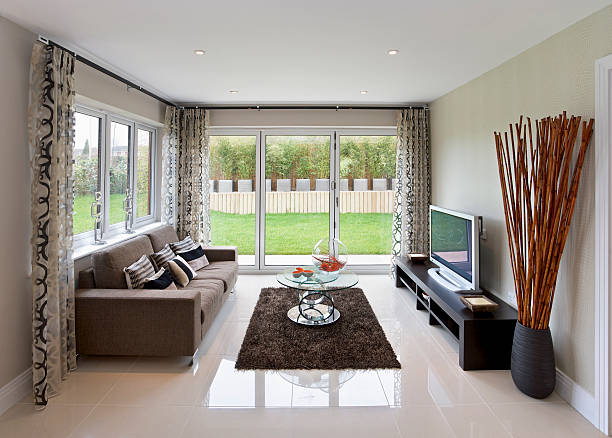 istock Modern television room with modern decor and large windows 185289043