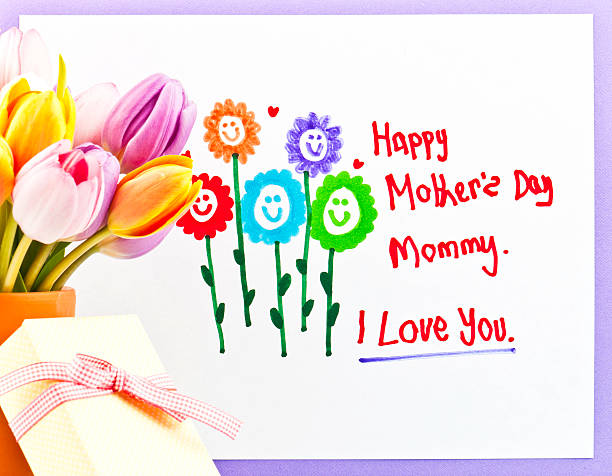 istock Child's Mother's Day Drawing with Flowers and Gift 185289408