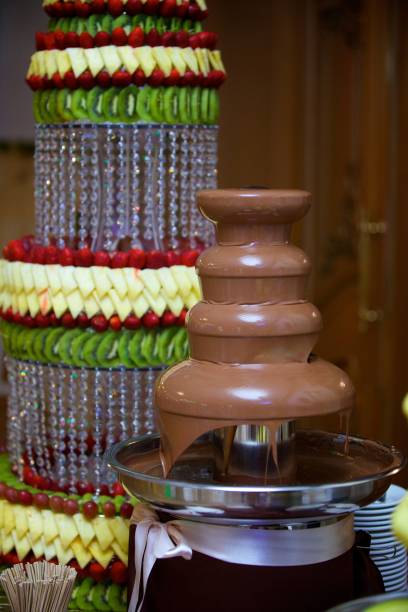 istock Chocolate fountain, decorated with ribbon 1852895096