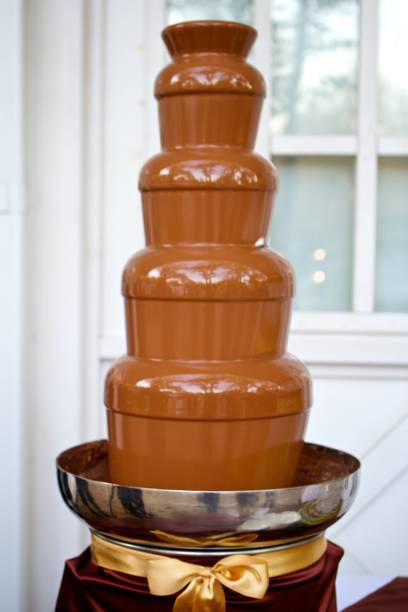 istock Chocolate fountain, decorated with ribbon 1852896118