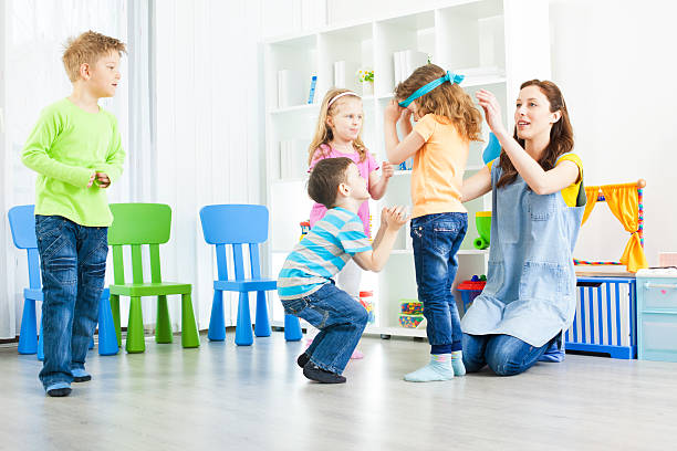 istock Preschool: Preschoolers Playing Hide and Seek. 185289706