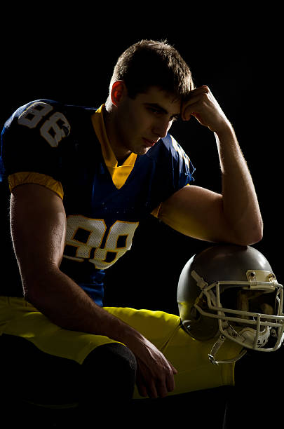 istock Depressed football player 185289889