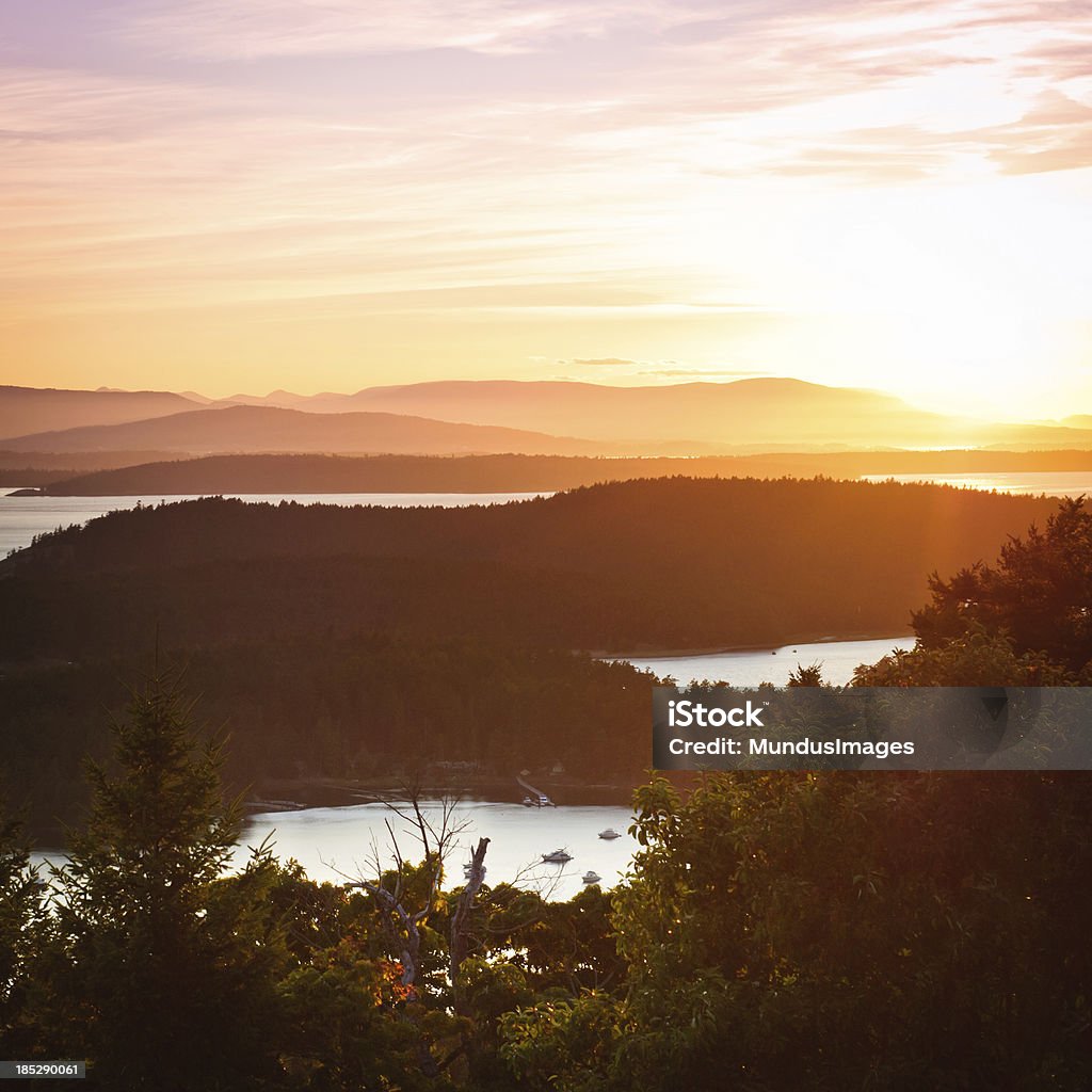 San Juan Islands At Sunset "The San Juan Islands of Washington State at Sunset. Looking toward Victoria,BC." Friday Harbor Stock Photo