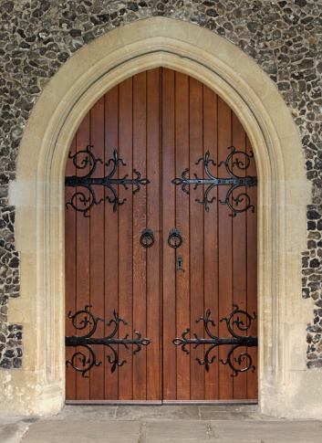 PRINCETON, NJ USA - NOVENBER 12, 2019:  forged door hinges on the door to Chapel on the campus of Princeton University in Princeton, New Jersey