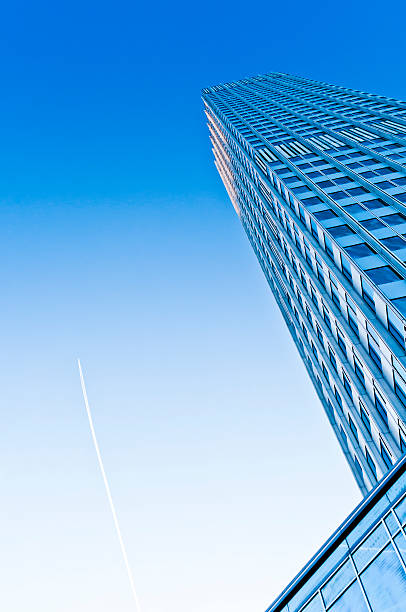 istock Eurotower with blue sky and jet trail 185290585