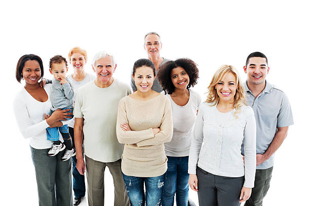 Group of Happy Multi-generation Family smiling. Group of Happy Multi-generation Family smiling and standing together.   mixed age range stock pictures, royalty-free photos & images