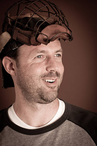 istock Vintage Baseball Player With Catcher's Mask Pushed Up on Head 185291203