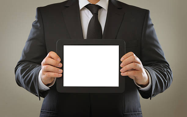 istock Businessman showing blank digital tablet 185291719