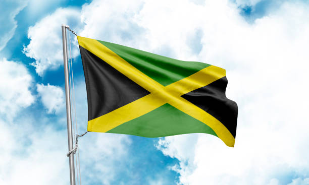 istock Jamaica flag waving on sky background. 3D Rendering 1852928730