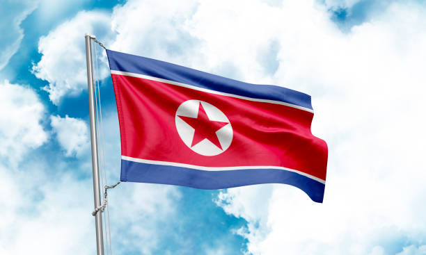 istock Korea North flag waving on sky background. 3D Rendering 1852932792