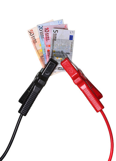 istock european currency in jump-start cables 185293695