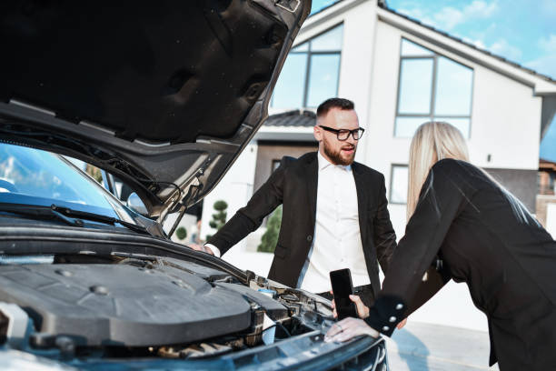 istock Business Couple Thinking Of A Solution To Car Breakdown Problems 1852949075