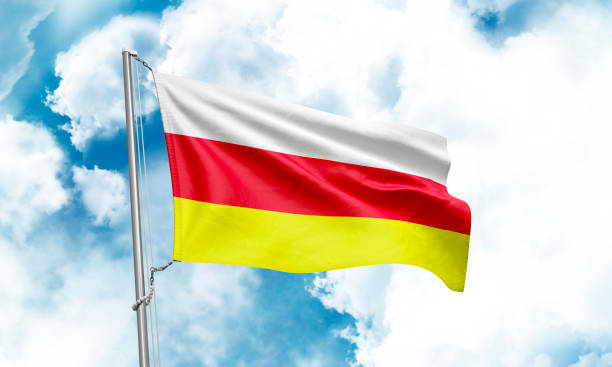 istock North Ossetia flag waving on sky background. 3D Rendering 1852949206