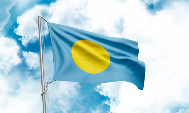 istock Palau flag waving on sky background. 3D Rendering 1852950633