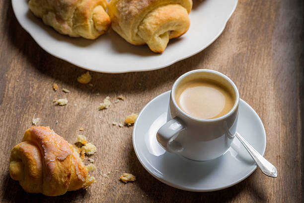 istock Breakfast with espresso and a fresh croissant 185295240