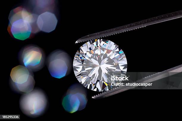Diamond Jewelry Holding Stock Photo - Download Image Now - Diamond - Gemstone, Tweezers, Lens Flare