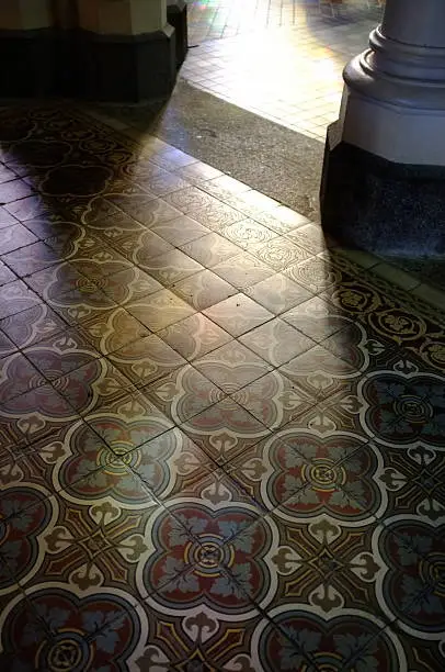 Wide angle image of Victorian tiled floor.