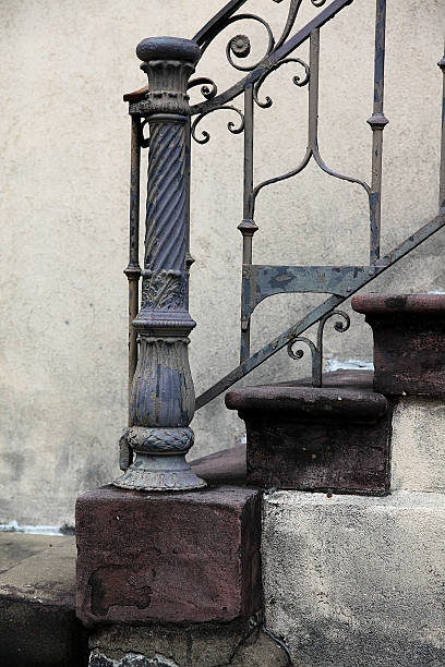 Iron Rail on Steps stock photo