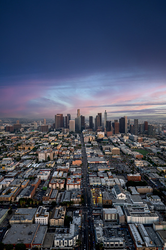 Magical moments of LA Downtown just after sunset during blue hour, captured from a helicopter point of view.