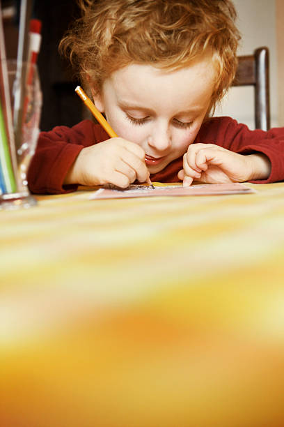istock Little boy drawing a picture 185296272