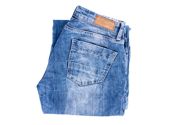 Folded jeans stock photo