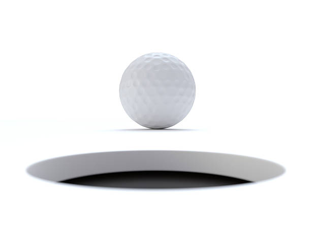 Golf ball very close to the hole To The Target hole stock pictures, royalty-free photos & images
