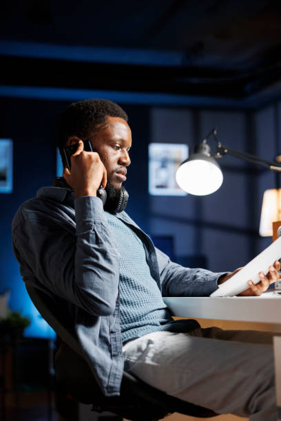 istock Financial investor analyzing capital balance report papers 1852970436