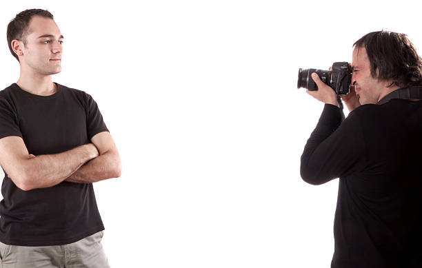 istock photographer  photographing young man. 185297257