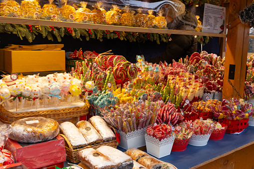 Tallinn, Estonia - 12/09/2023 market booth with sweets at the christmas market in Tallinn