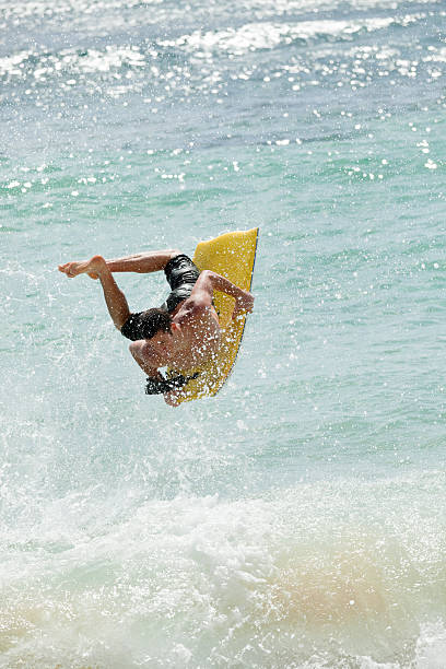 istock Young Man Bodyboarding in Kauai Hawaii 185297646
