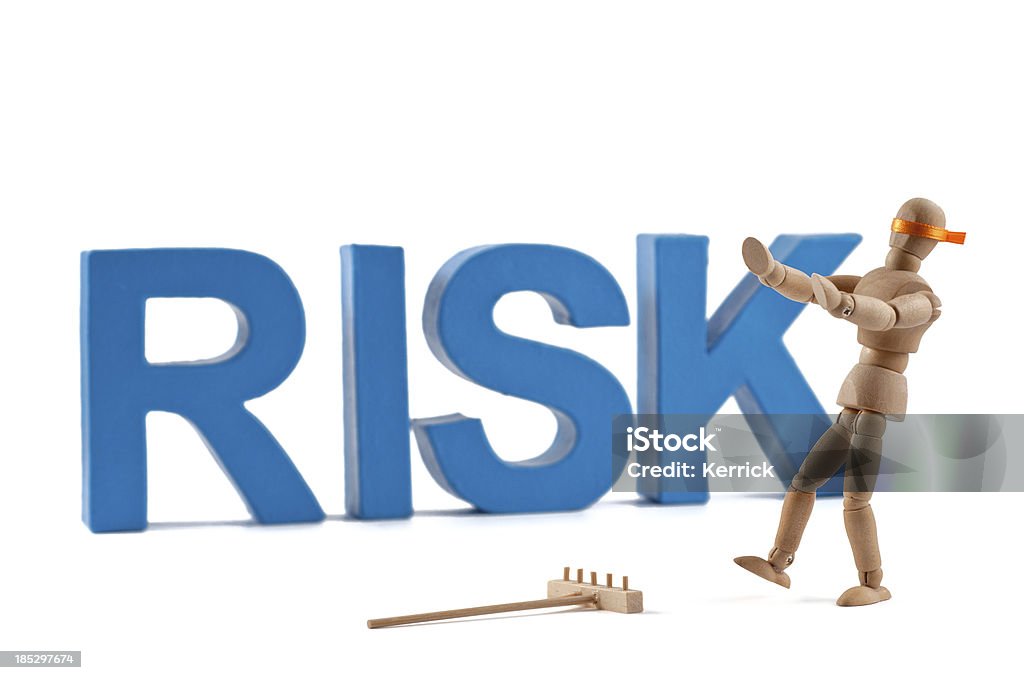 Risiko-Hölzerne Kleiderpuppe was das Wort - Lizenzfrei Alphabet Stock-Foto