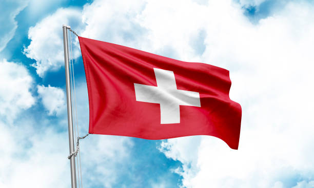istock Switzerland flag waving on sky background. 3D Rendering 1852979004