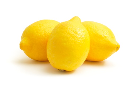 Three lemons isolated on a white background.