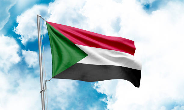 istock Sudan flag waving on sky background. 3D Rendering 1852980050