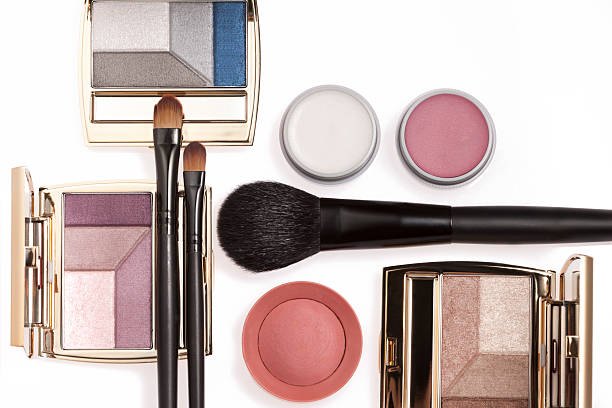 istock Open make-up and brushes set out on a white counter 185298190