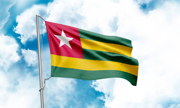 istock Togo flag waving on sky background. 3D Rendering 1852982721