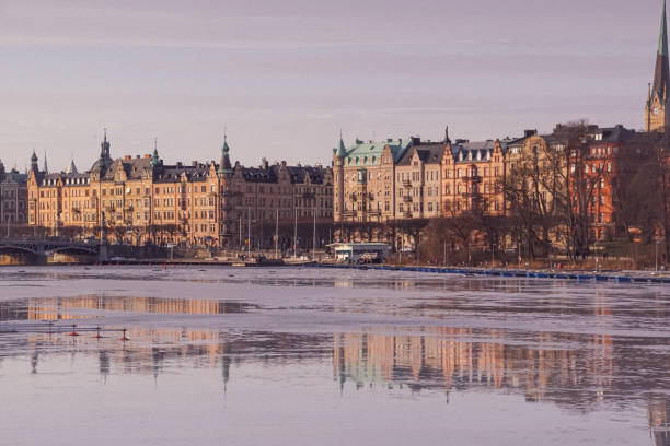 istock View of a city at a river during winter 1852992174