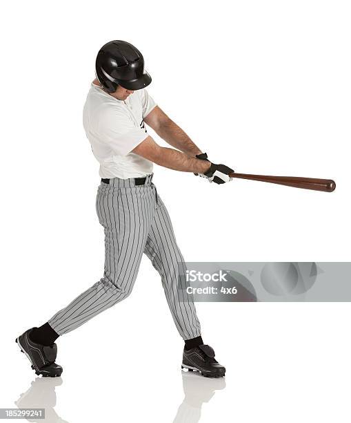 Baseballspieler In Aktion Stockfoto und mehr Bilder von Baseball - Baseball, Schwingen, Weißer Hintergrund