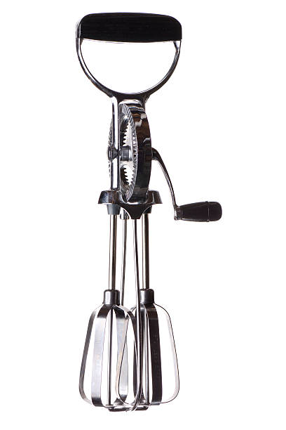 An old-fashioned hand mixer on a white background.  Isolated in camera.More